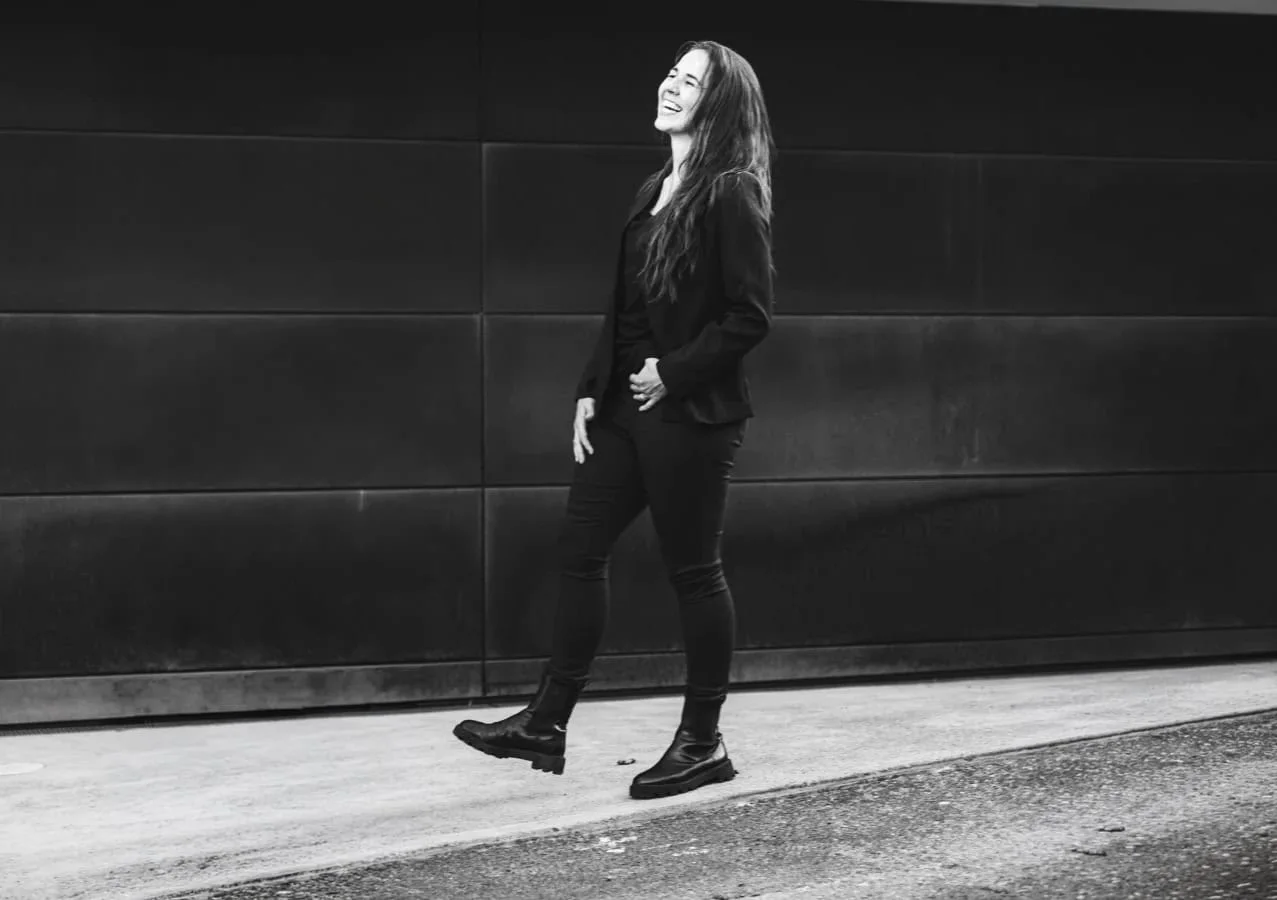 Manon Vernay, founder of Creative Baguette, walking and laughing